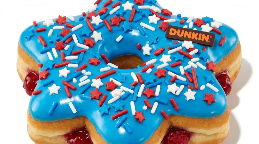 Dunkin Rocket Pop Donut 2026 star-shaped with blue icing and red white blue sprinkles